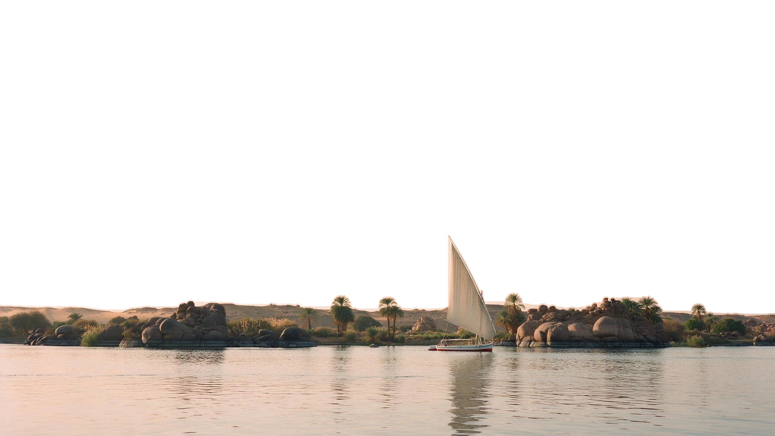 A felucca sailing past the granite islands of Aswan